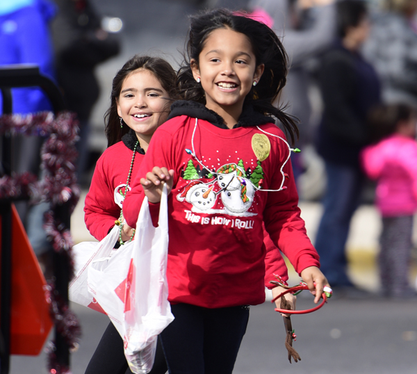 kid running with candy