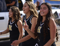 cheerleaders waving