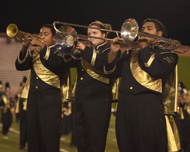 guys playing trumpets