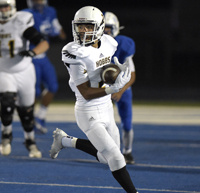 football player turning upfield