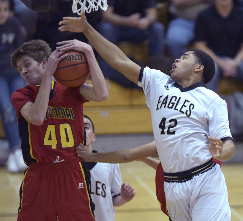 player reaching for rebound