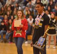 bosquez holding trophy