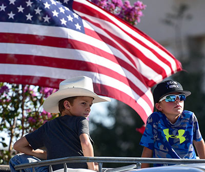 two boys on a float