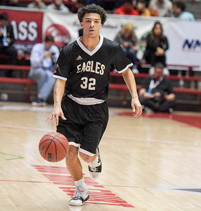 player dribbling ball up court