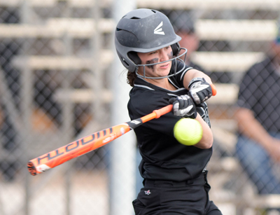 girl hitting ball