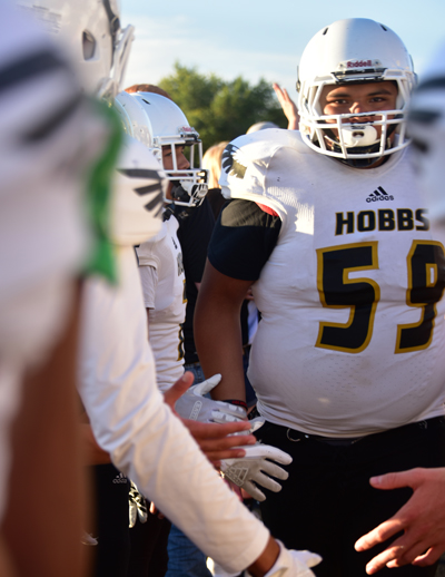 football player with helmet on