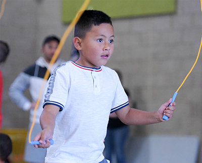 boy jumping rope