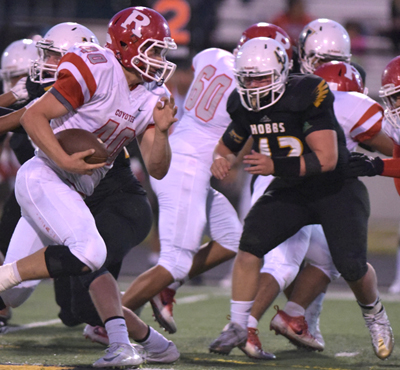 defense getting ready to tackle offensive player