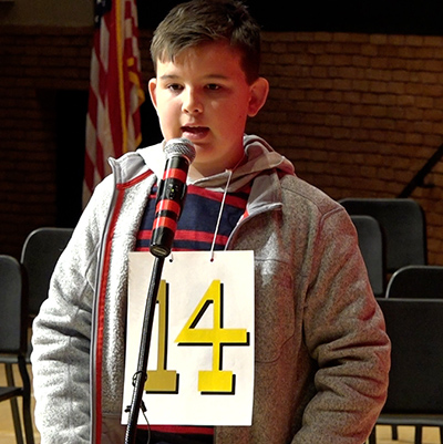 speller at microphone