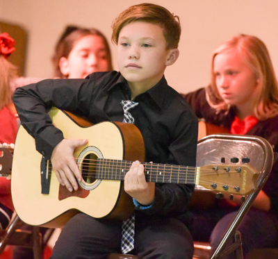 student with guitar