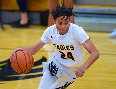 player dribbling ball up court