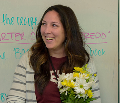 smiling woman with flowers