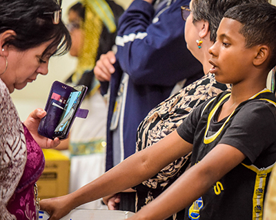 student talking to parent