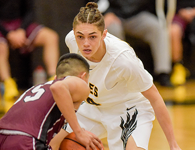 eagle player in white playing defense