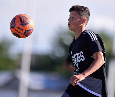 player looking at ball in air