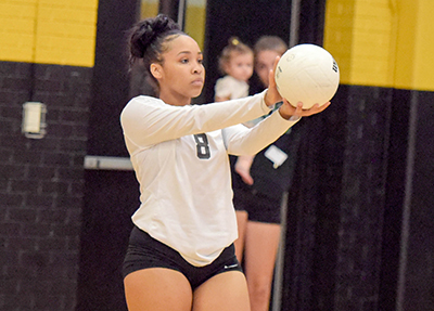 player getting read to serve ball