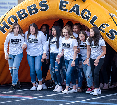 volleyball players getting ready to come out of eagle tunnel