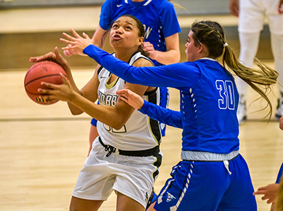 player underneath basket getting blocked