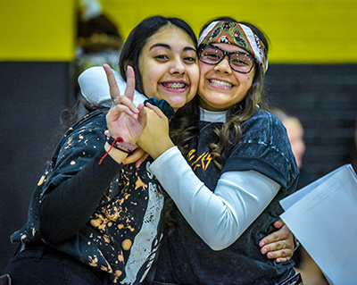 two girls hugging