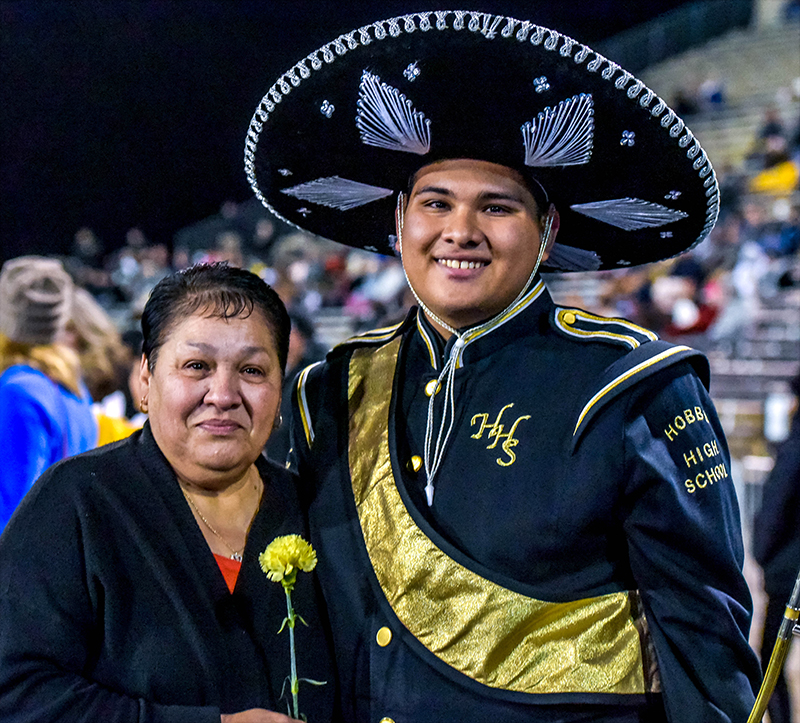 band member hugging parent