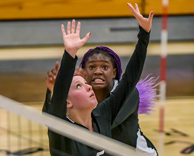 girl setting volleyball