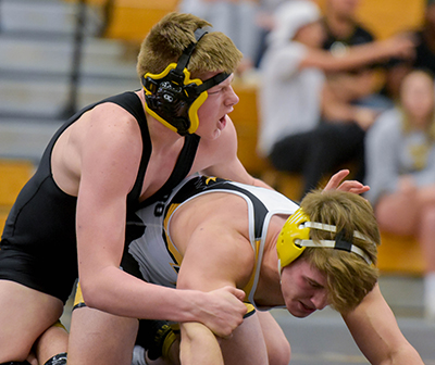 two wrestlers on mat