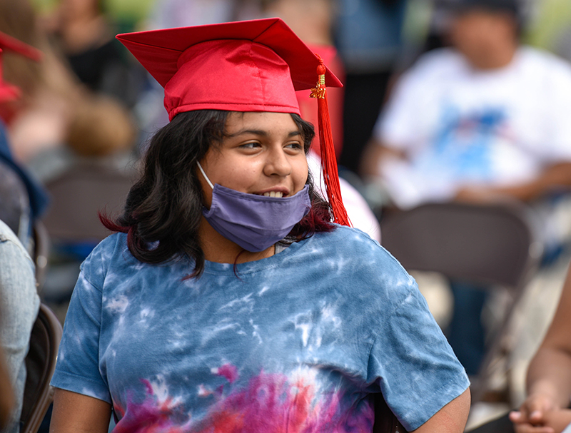 smiling girl in mortar board