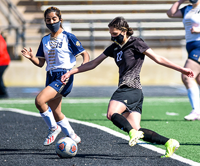 two players with soccer ball