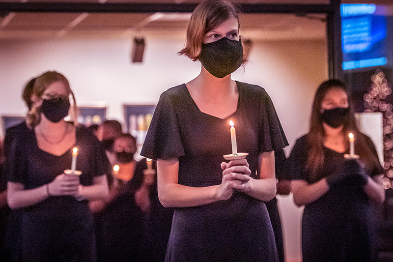 girl holding candle