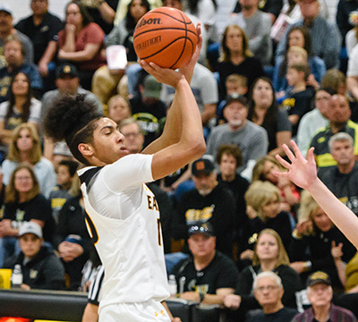 guy going up for jump shot