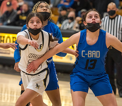 two girls waiting for free throw rebound