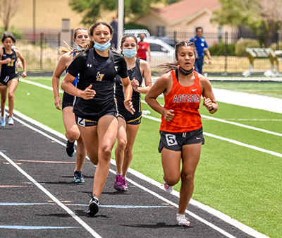 girls running on track