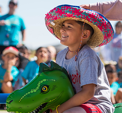 smiling kid in hat