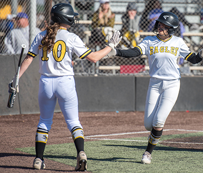 player crossing home plate