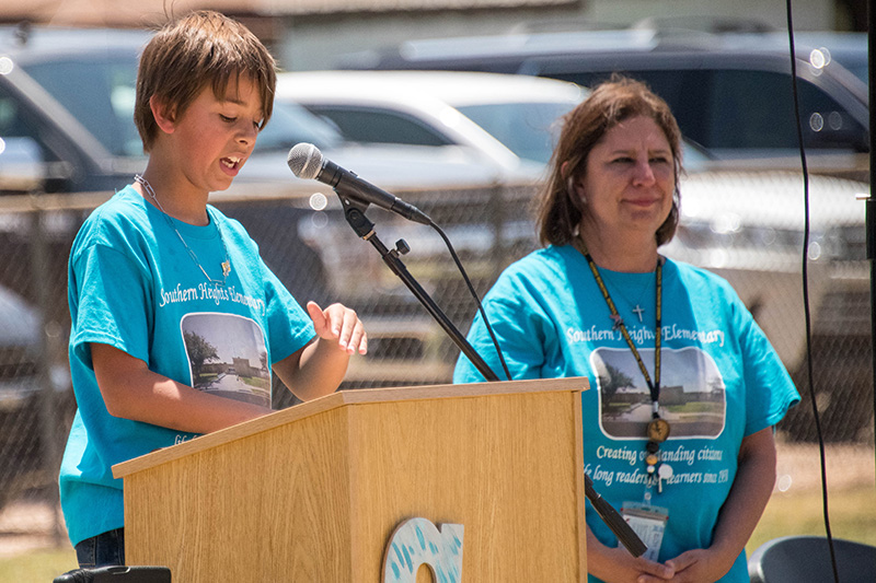 student standing at podium