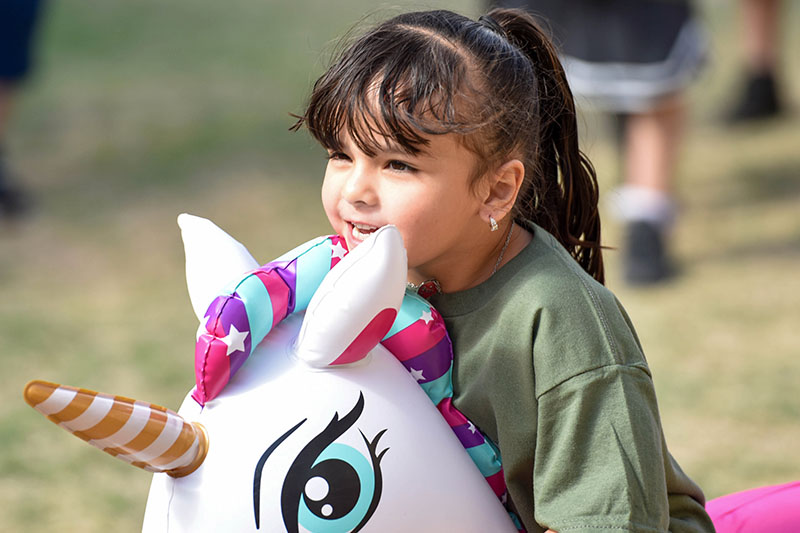 little girl on unicorn