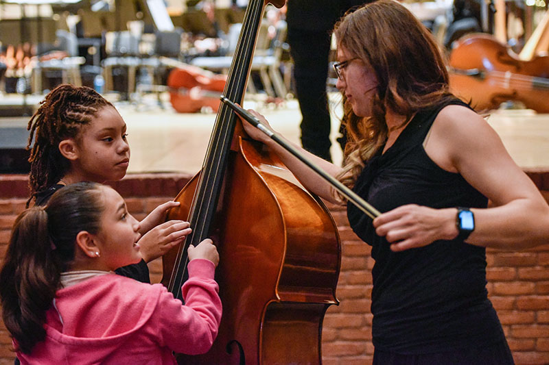 SWS musician with students