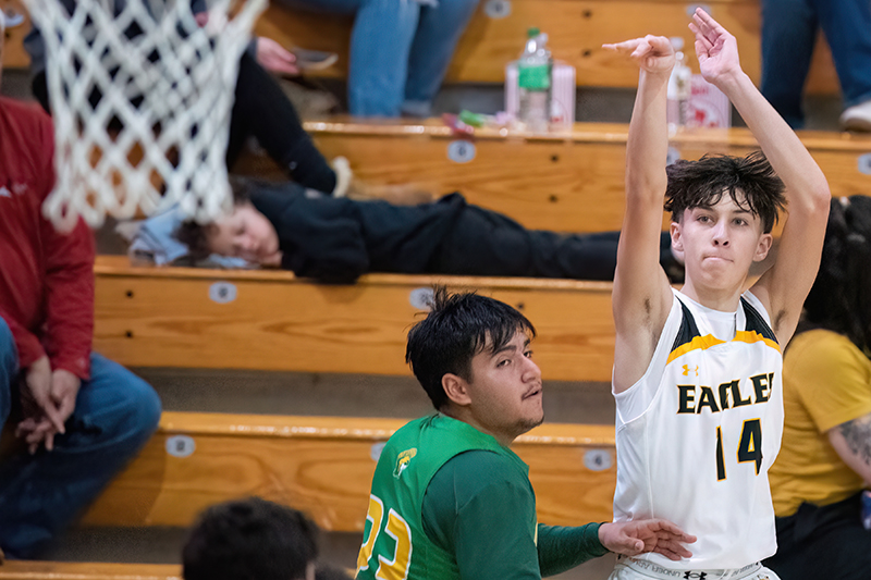 player shooting basket from court corner