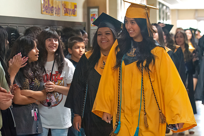 grads walk the heizer halls