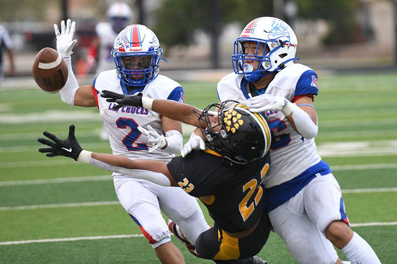 player reaching up for ball