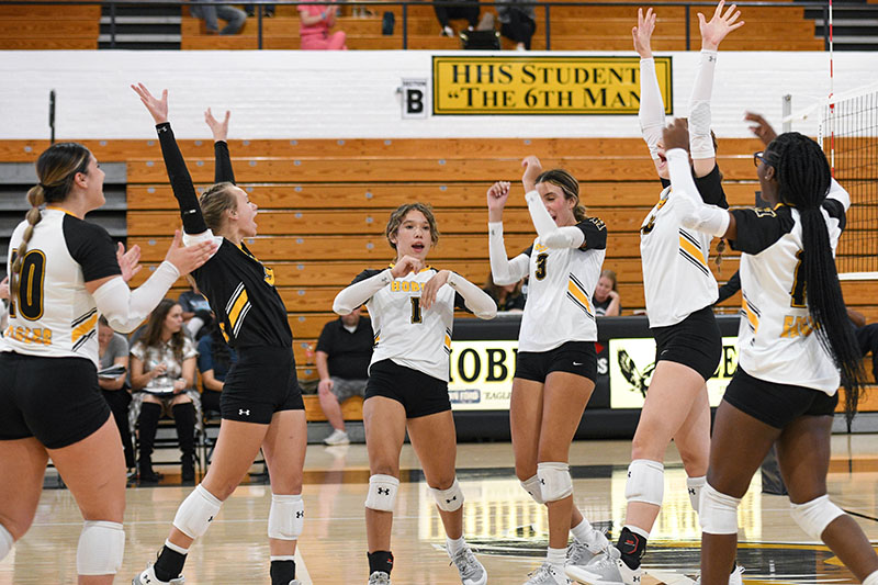 volleyball players cheering