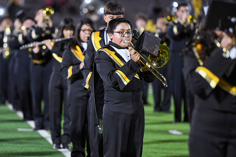 boy playing trombone