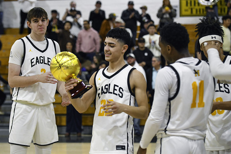 player holding trophy