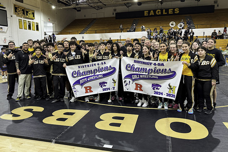 wrestling teams with district banners