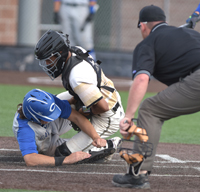 catcher getting player out at home