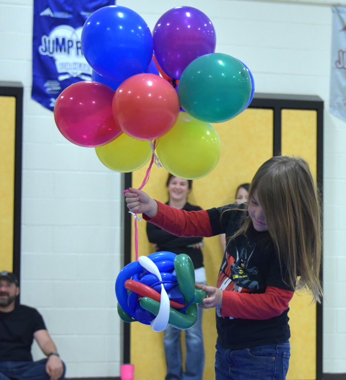 girl with egg and balloons