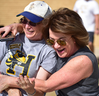 two teachers hugging