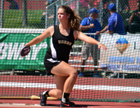 student throwing discus